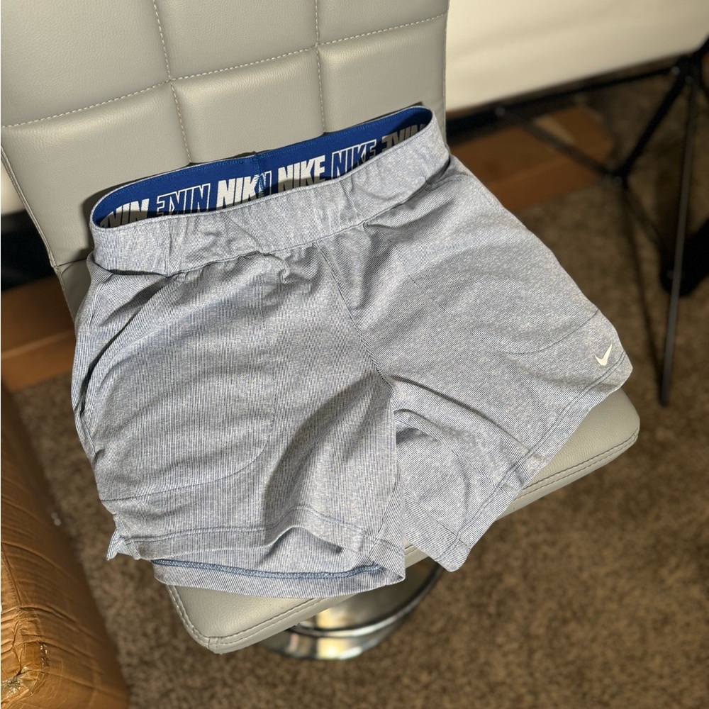 Nike blue dri-fit shorts with drawstrings. XS fits me and I wear medium